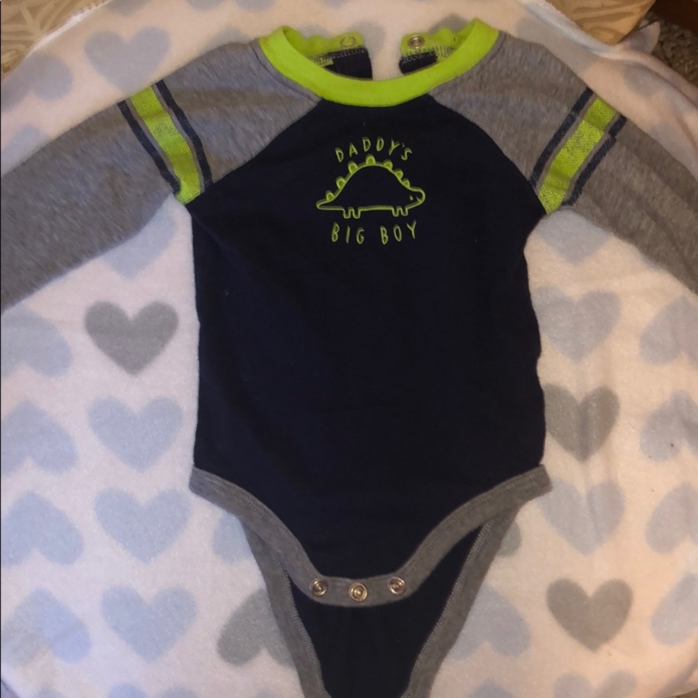 A green,gray and blue onesie